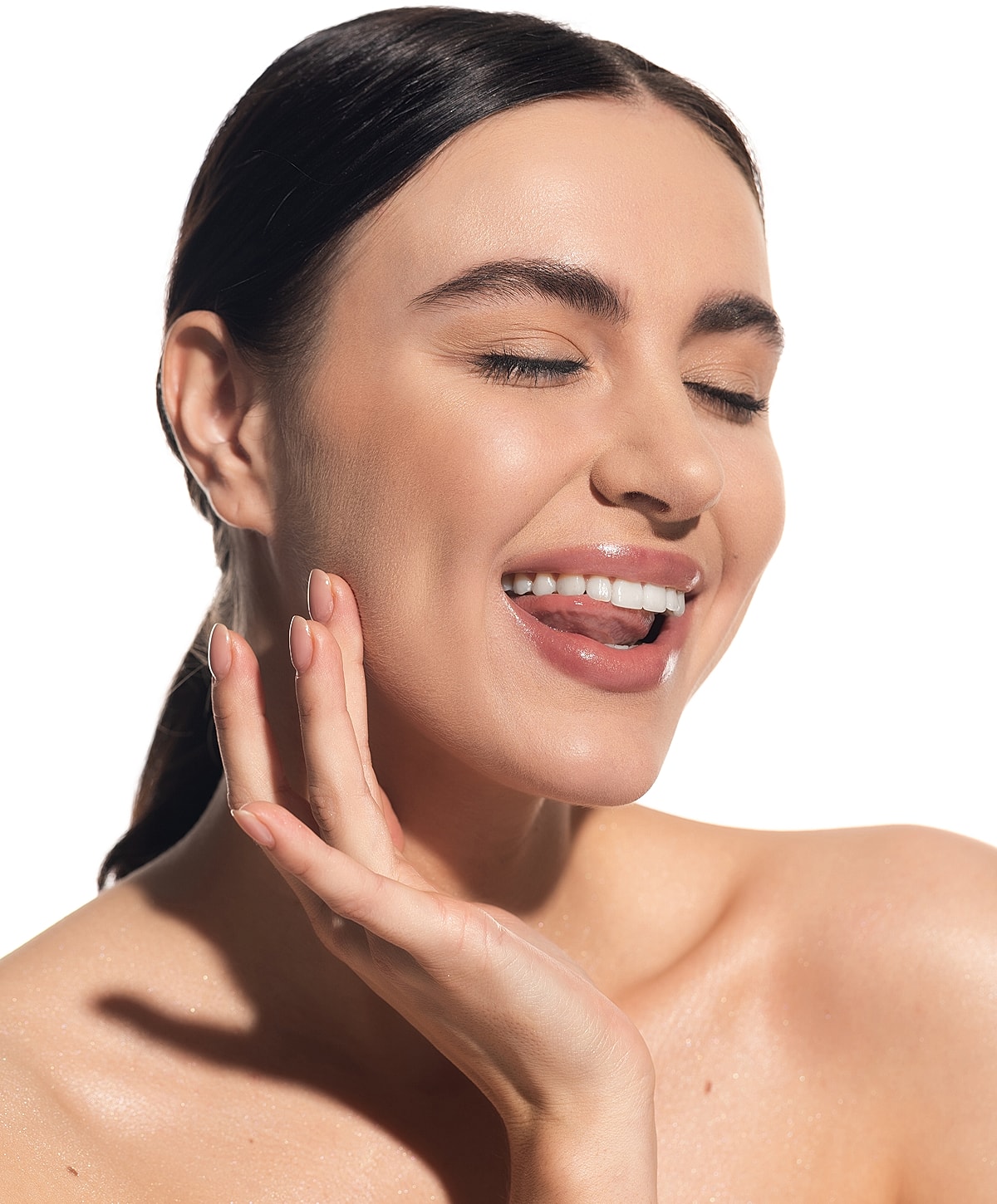 Smiling woman with natural beauty and glowing skin